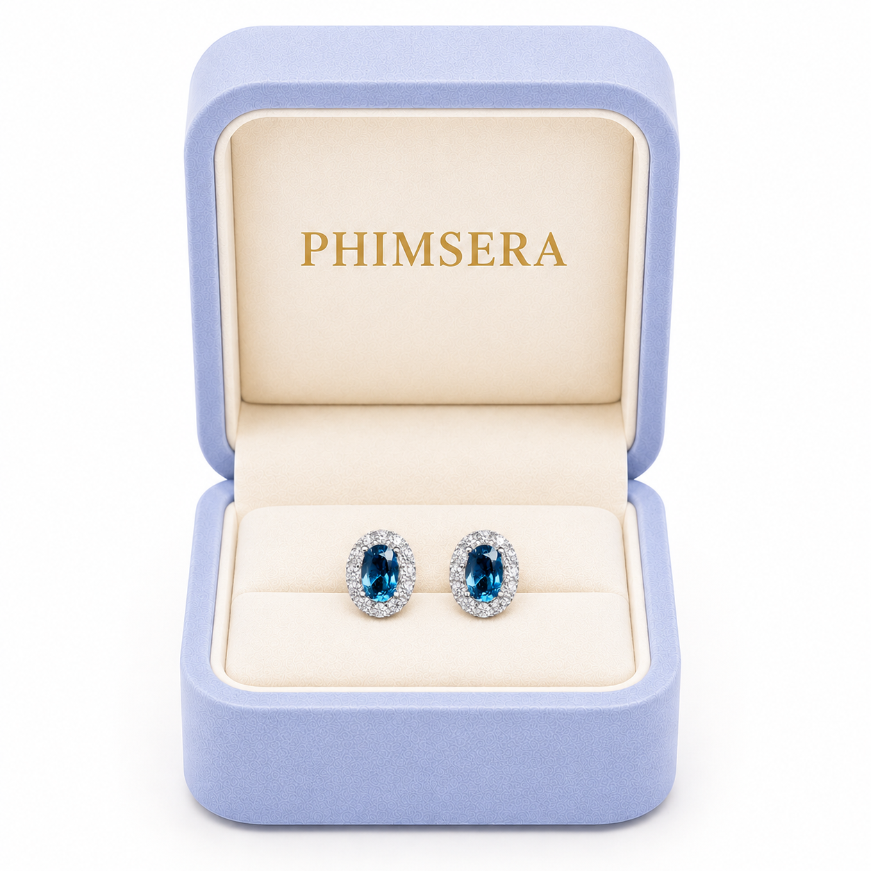 4x6mm London Blue Topaz stud earrings displayed in Phimsera jewelry gift box