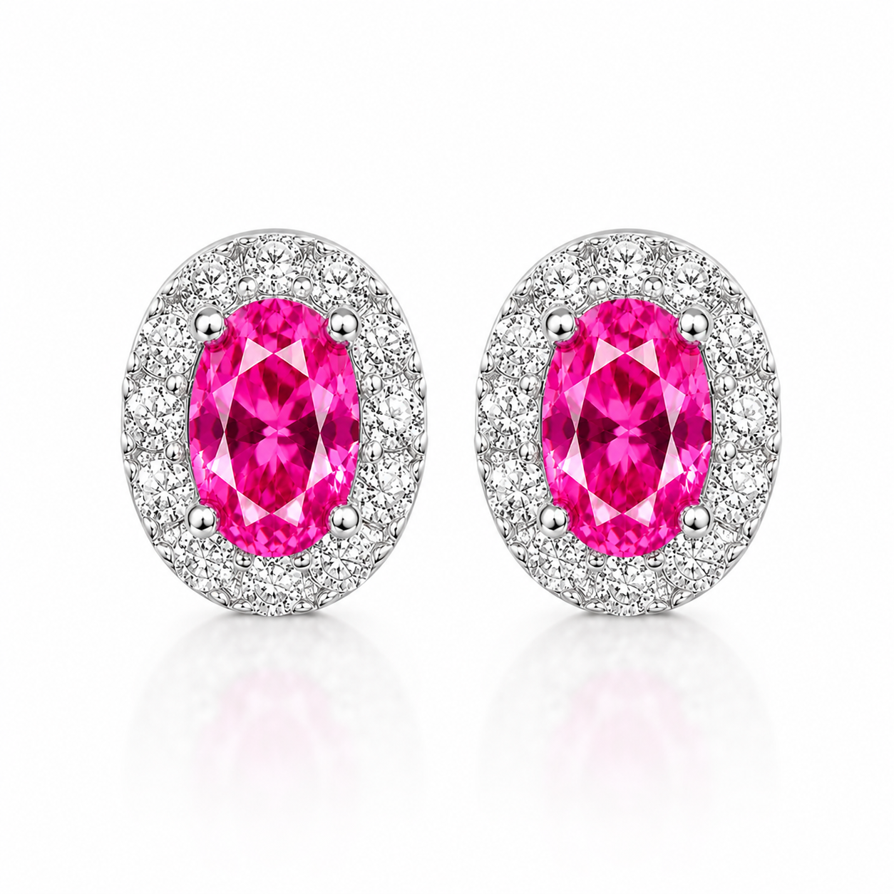 Top-down view of oval 4x6mm pink topaz halo earrings in sterling silver