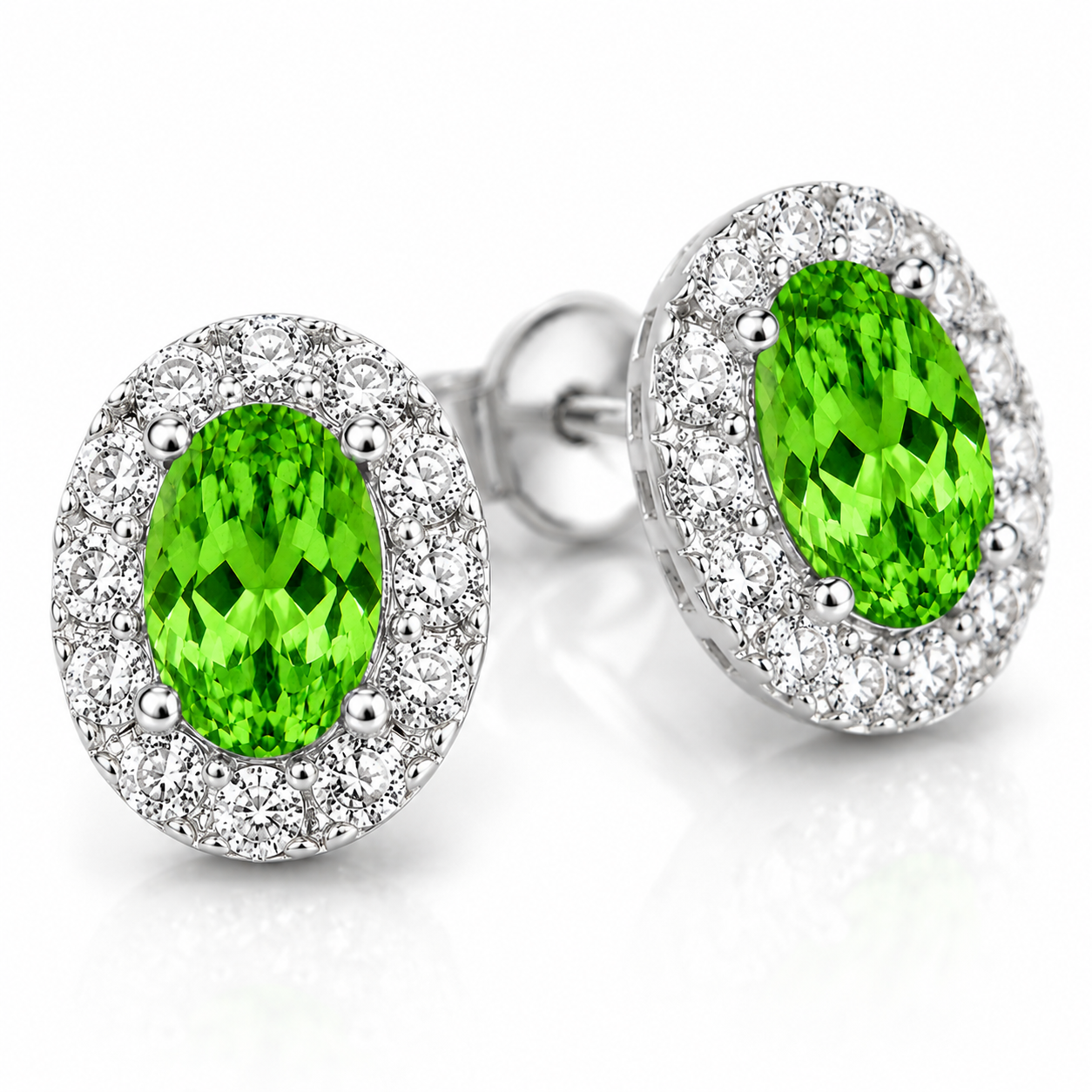 Macro close-up of natural green tsavorite earrings showing oval gemstone facets and halo details