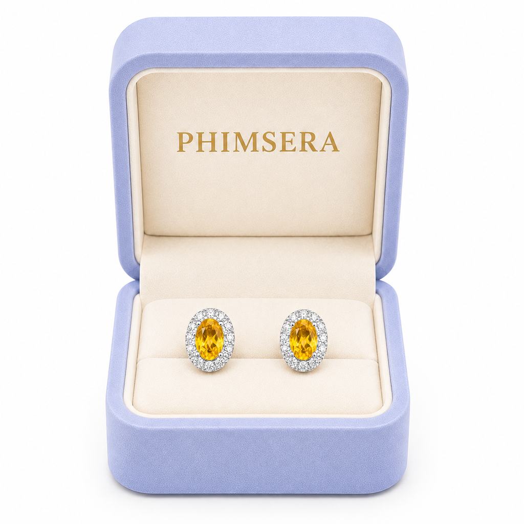 Natural 4x6mm citrine halo earrings displayed in Phimsera jewelry gift box