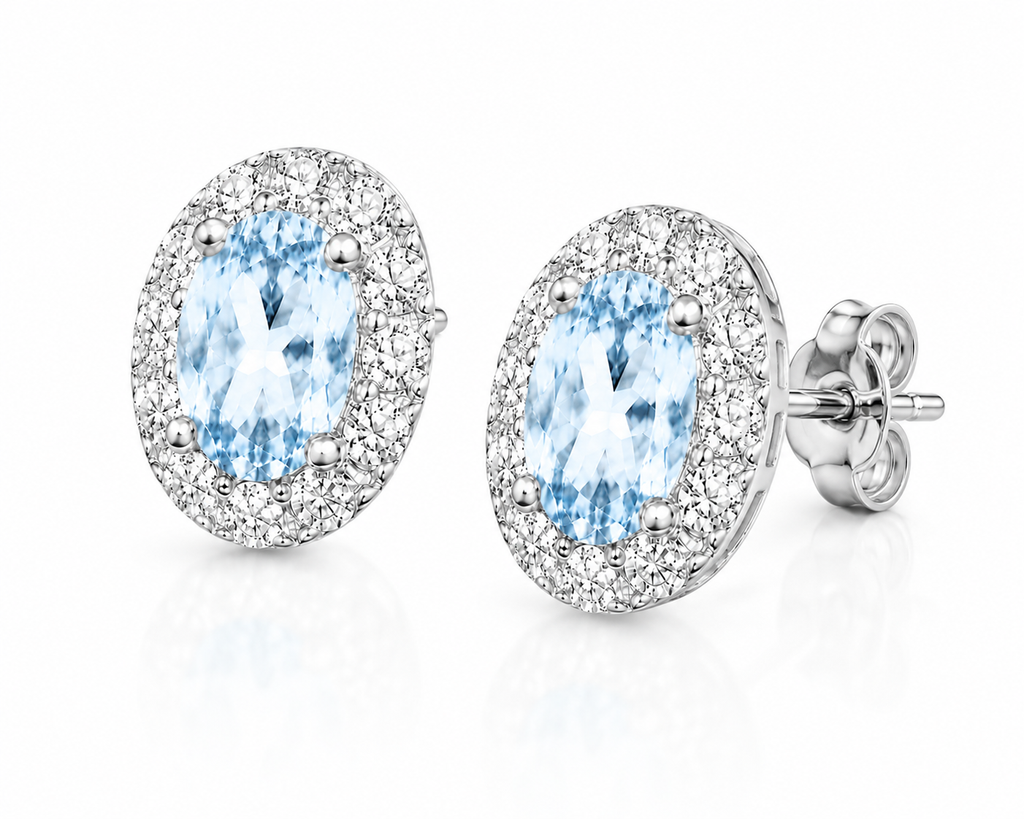 Natural Sky Blue Topaz 4x6mm oval halo earrings shown at 45 degree angle