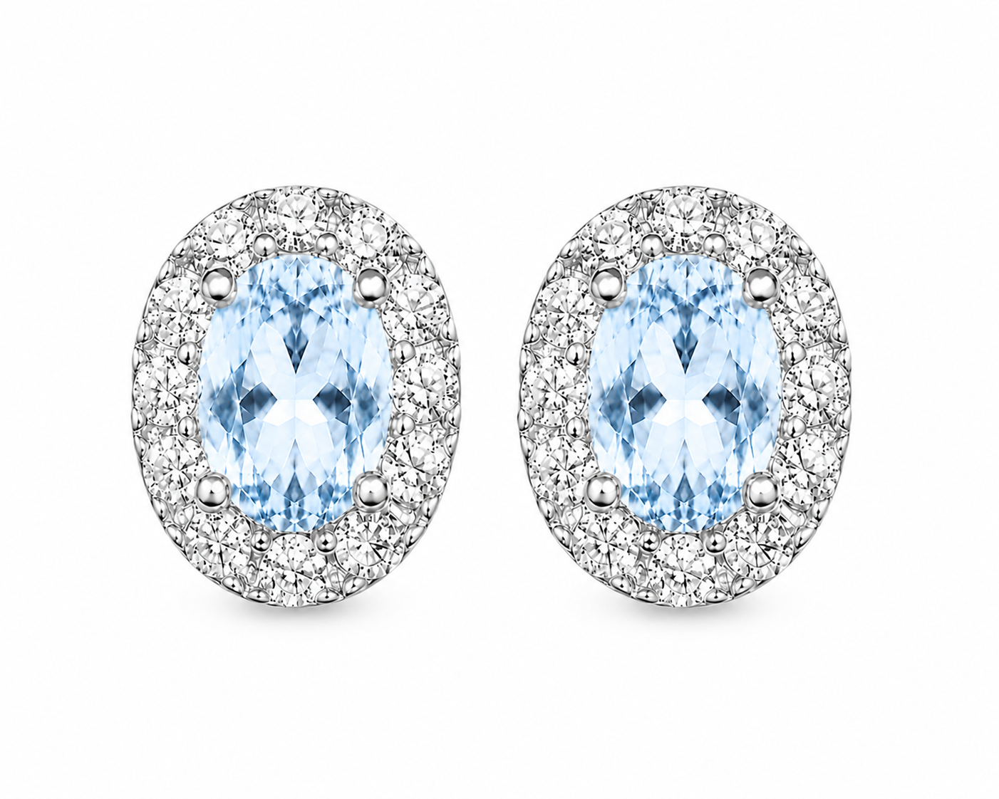 4x6mm Sky Blue Topaz oval halo stud earrings top view in sterling silver