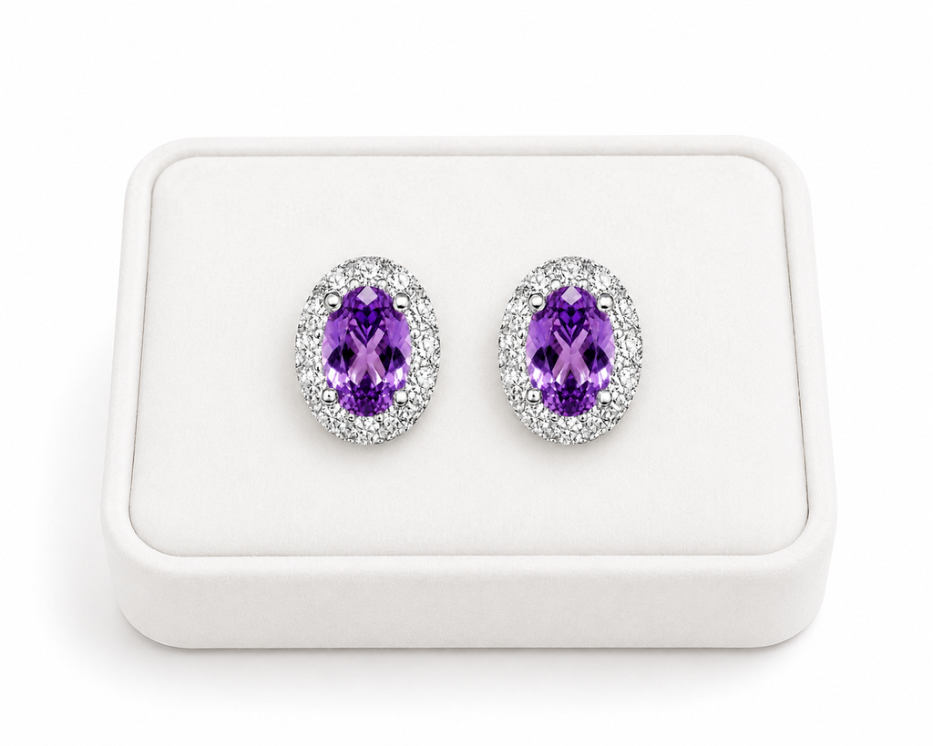 Natural 4x6mm amethyst halo earrings displayed on a luxury white jewelry tray