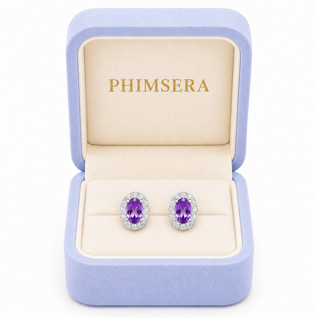 Natural amethyst halo stud earrings presented in a Phimsera jewelry gift box