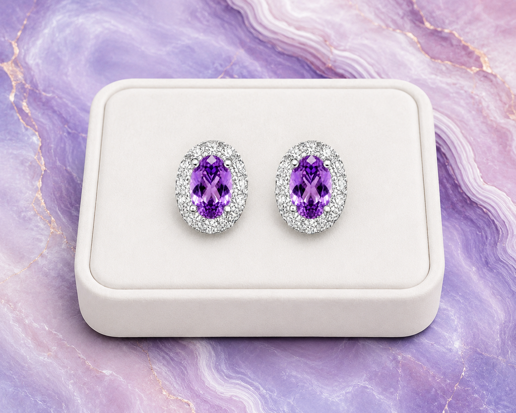 Natural 4x6mm amethyst halo earrings displayed on a luxury white jewelry tray