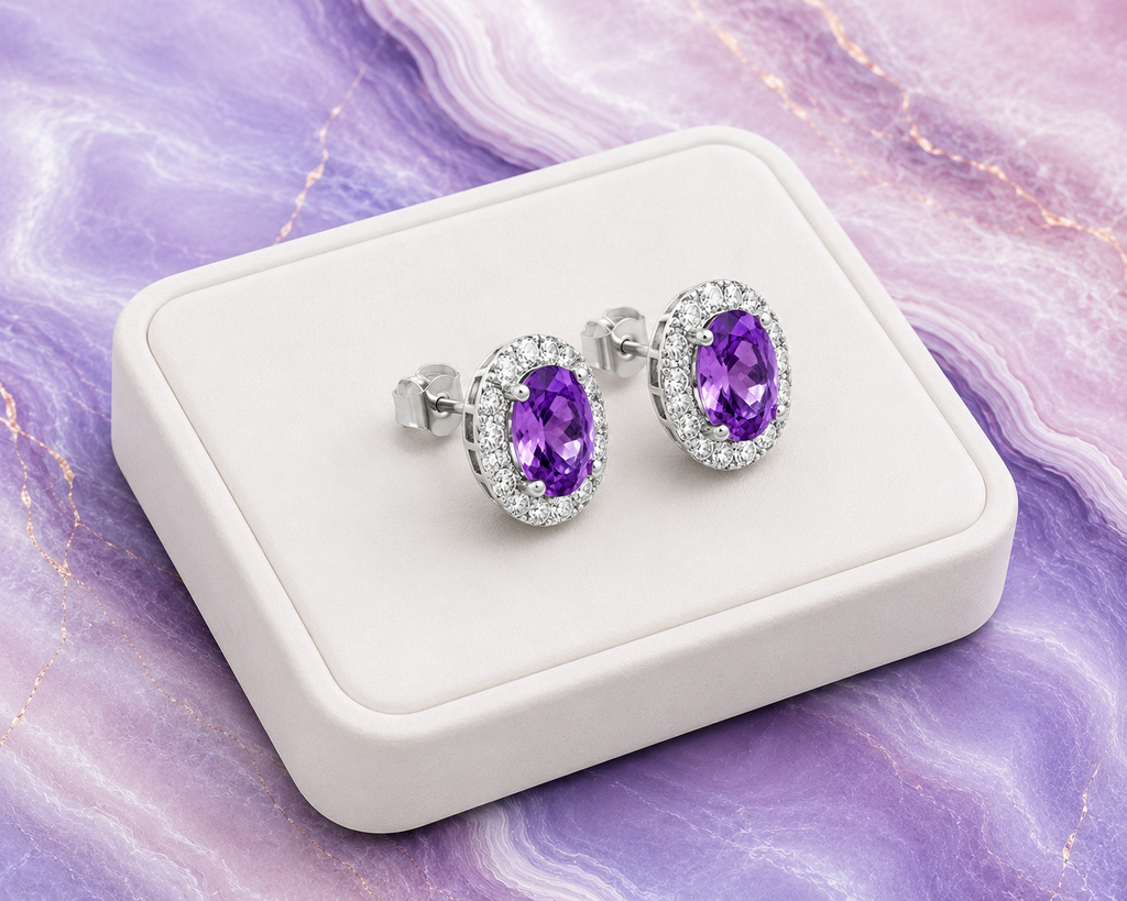 Natural 4x6mm amethyst halo earrings displayed on a luxury white jewelry tray