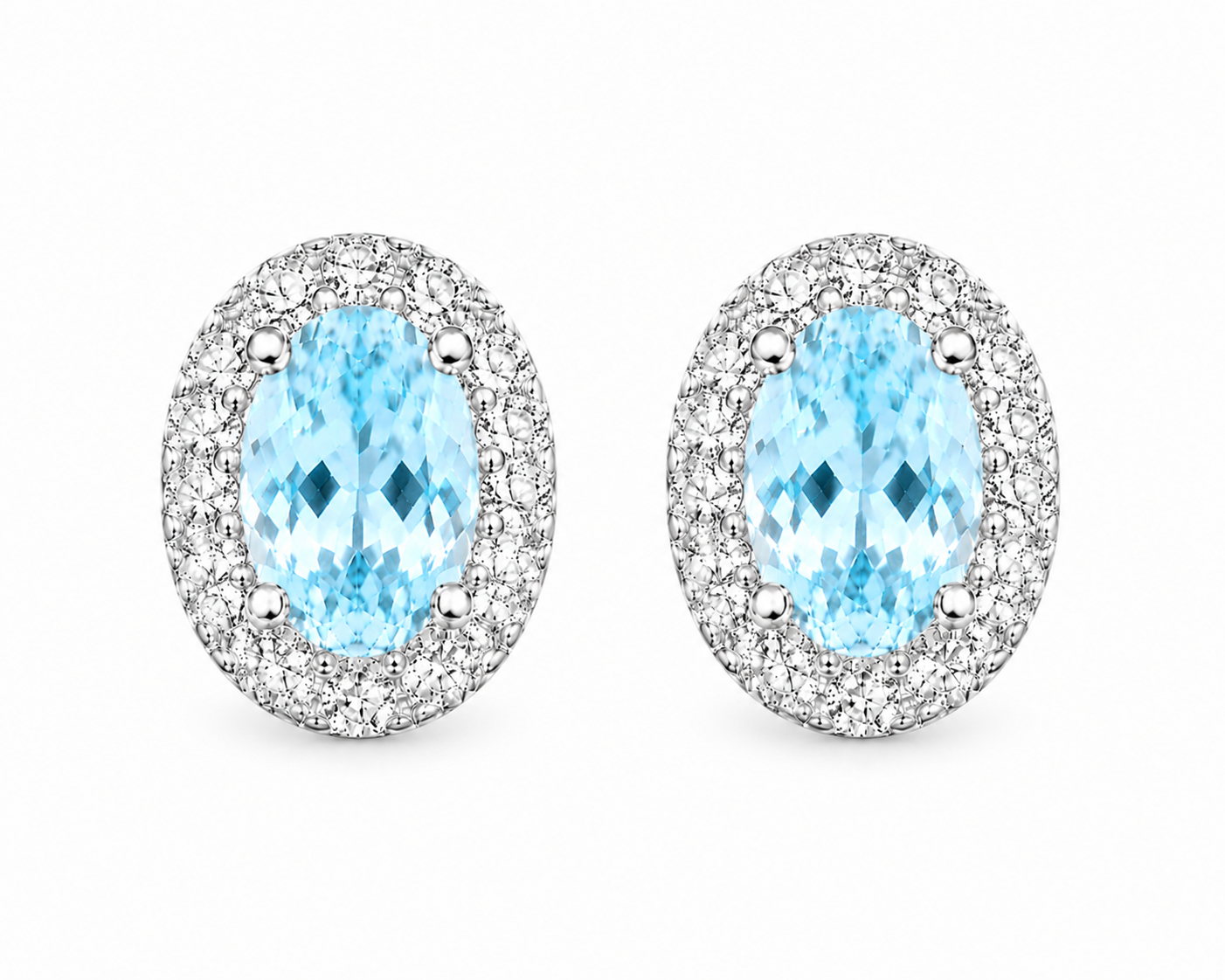 Top-down view of natural oval aquamarine halo stud earrings in sterling silver