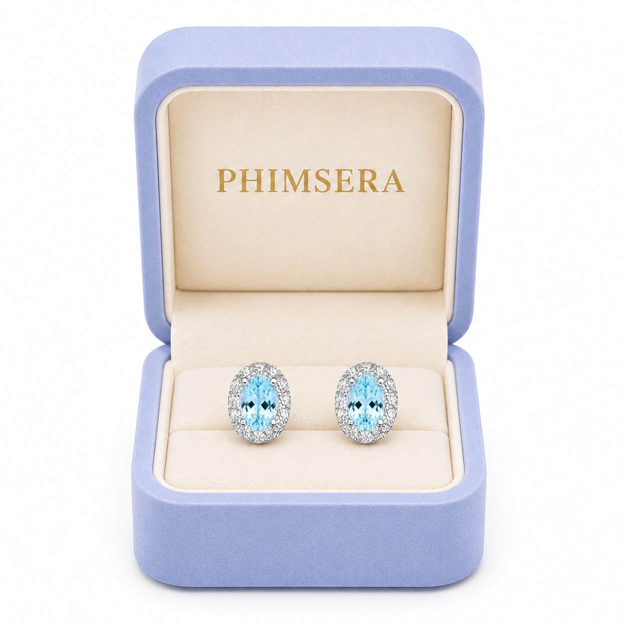 Natural aquamarine stud earrings presented in a Phimsera jewelry gift box