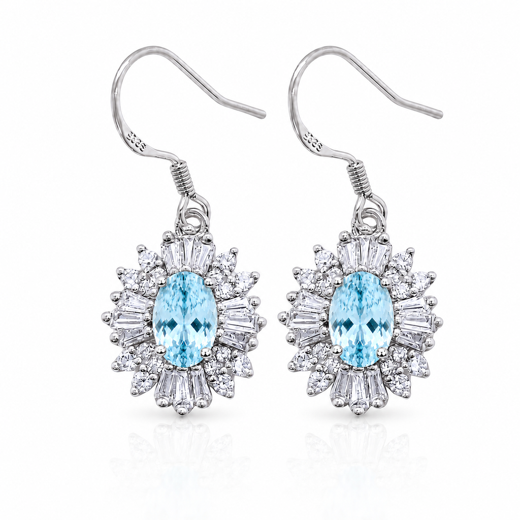 Natural 4x6mm oval aquamarine dangle earrings with CZ halo in 925 sterling silver front view