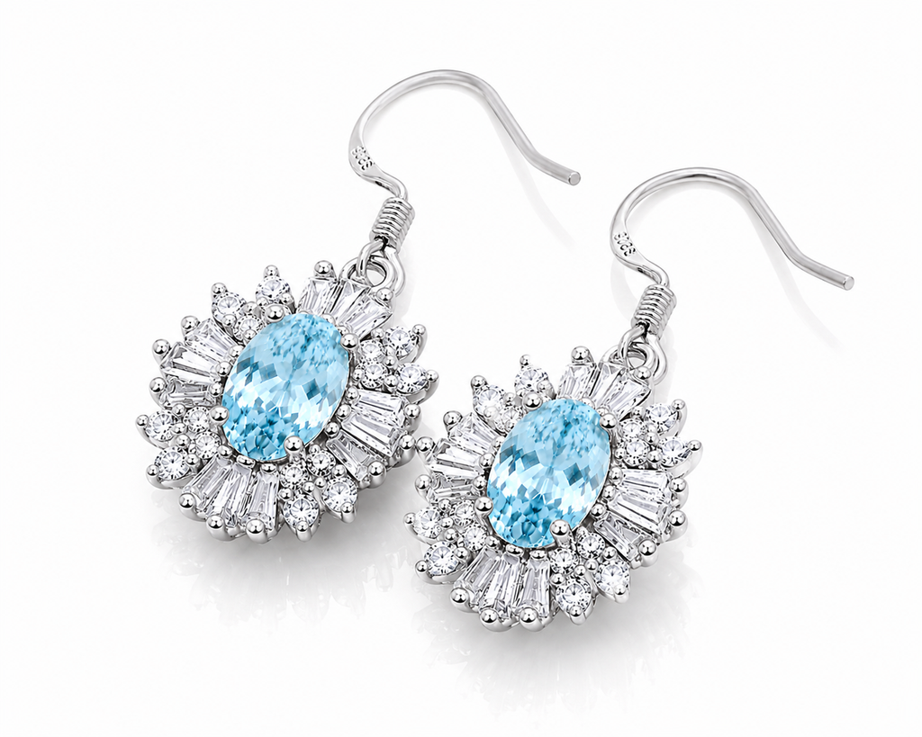Natural aquamarine 4x6mm dangle earrings in sterling silver shown at 45 degree angle