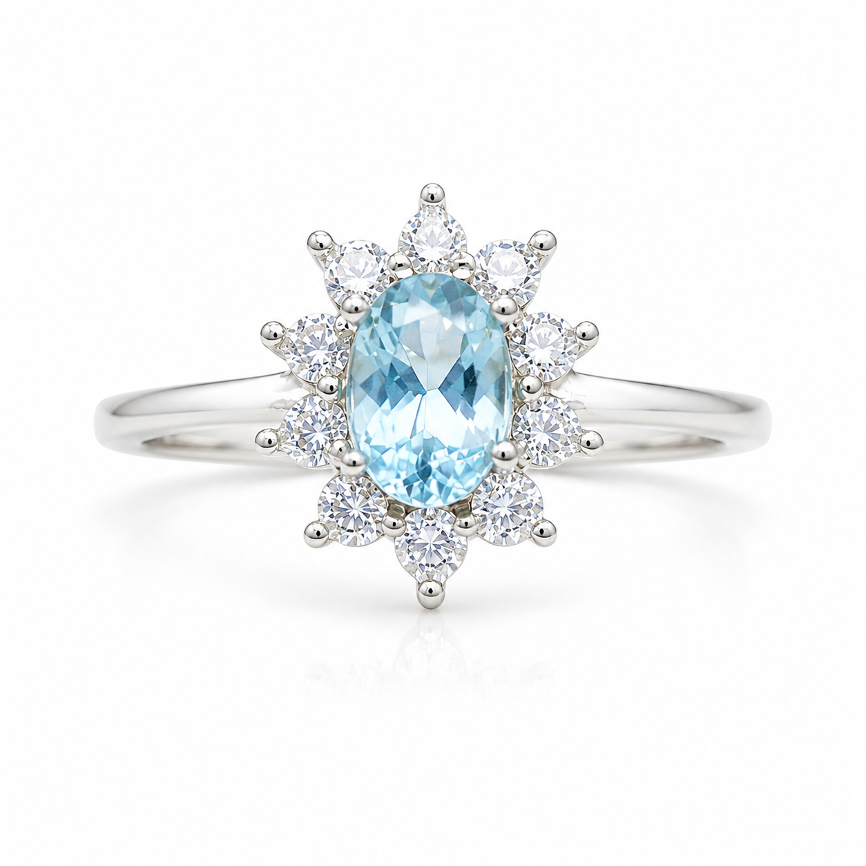 Natural 4x6mm oval aquamarine floral ring with sparkling cubic zirconia cluster accents