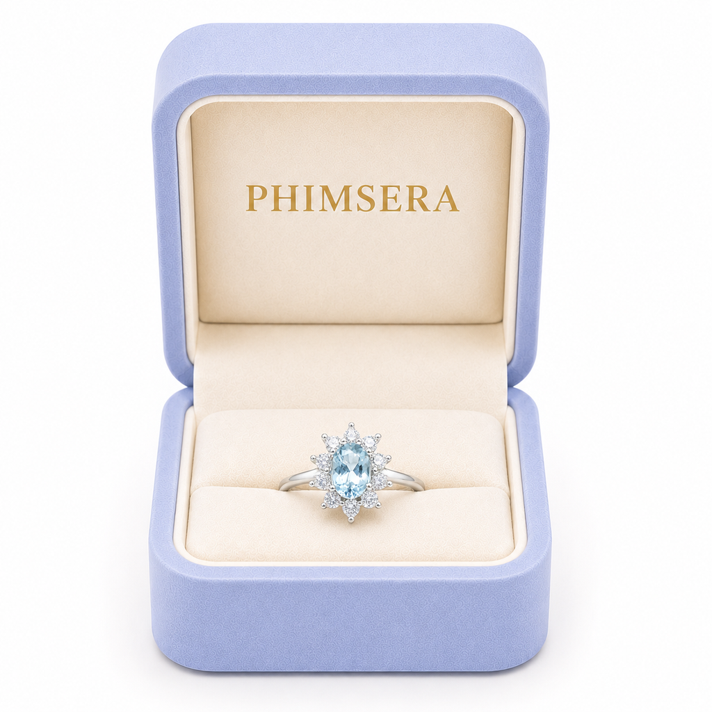 Natural aquamarine floral March birthstone ring displayed in luxury jewelry gift box