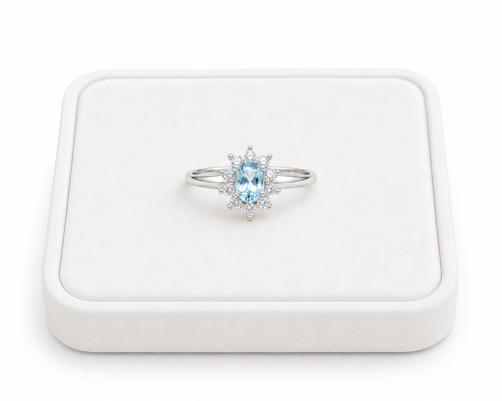 Natural 4x6mm oval aquamarine floral ring with sparkling cubic zirconia cluster accents