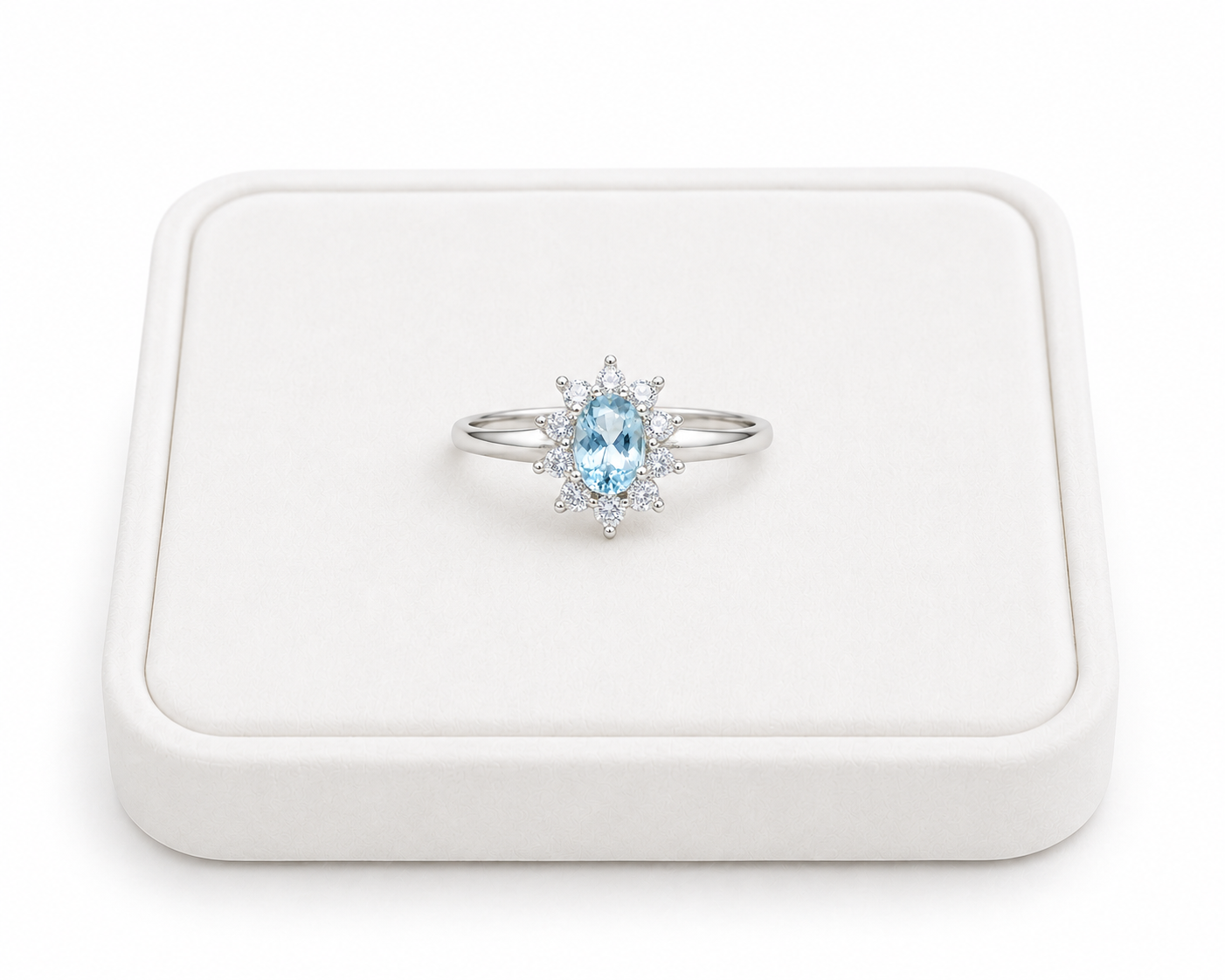 Natural 4x6mm oval aquamarine floral ring with sparkling cubic zirconia cluster accents