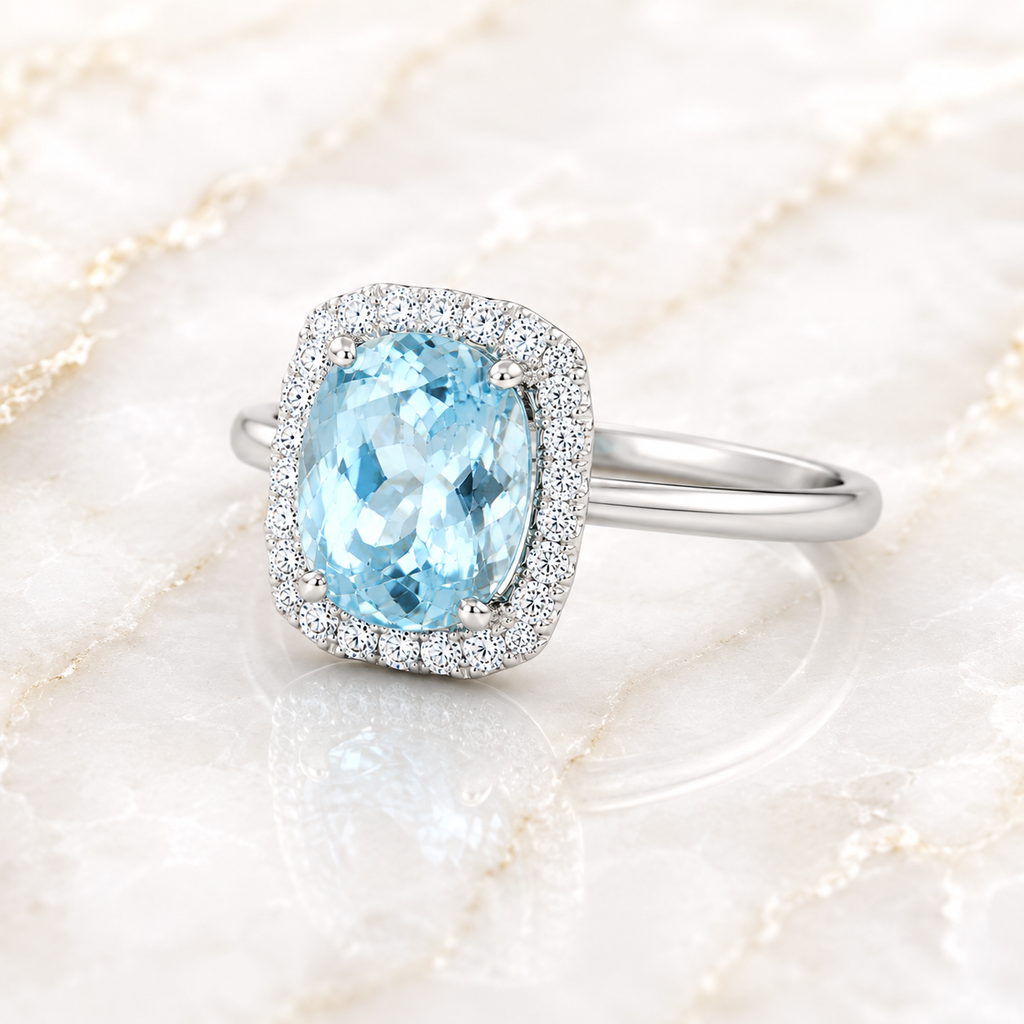Natural aquamarine halo ring with 8.5x9.5mm gemstone and cubic zirconia accents