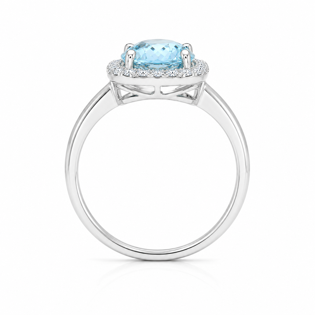 Side profile of natural aquamarine gemstone halo ring in 925 sterling silver