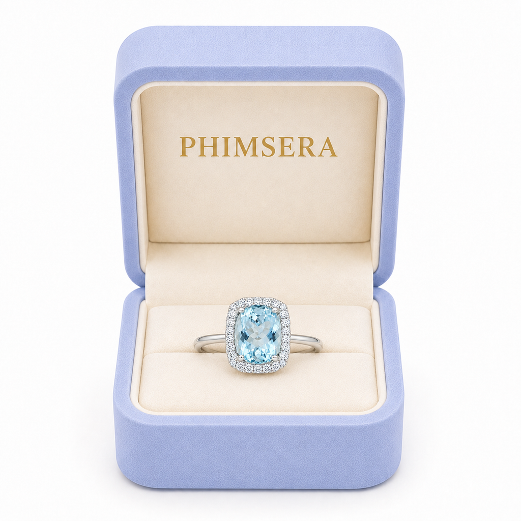 Natural aquamarine halo ring with 8.5x9.5mm gemstone and cubic zirconia accents