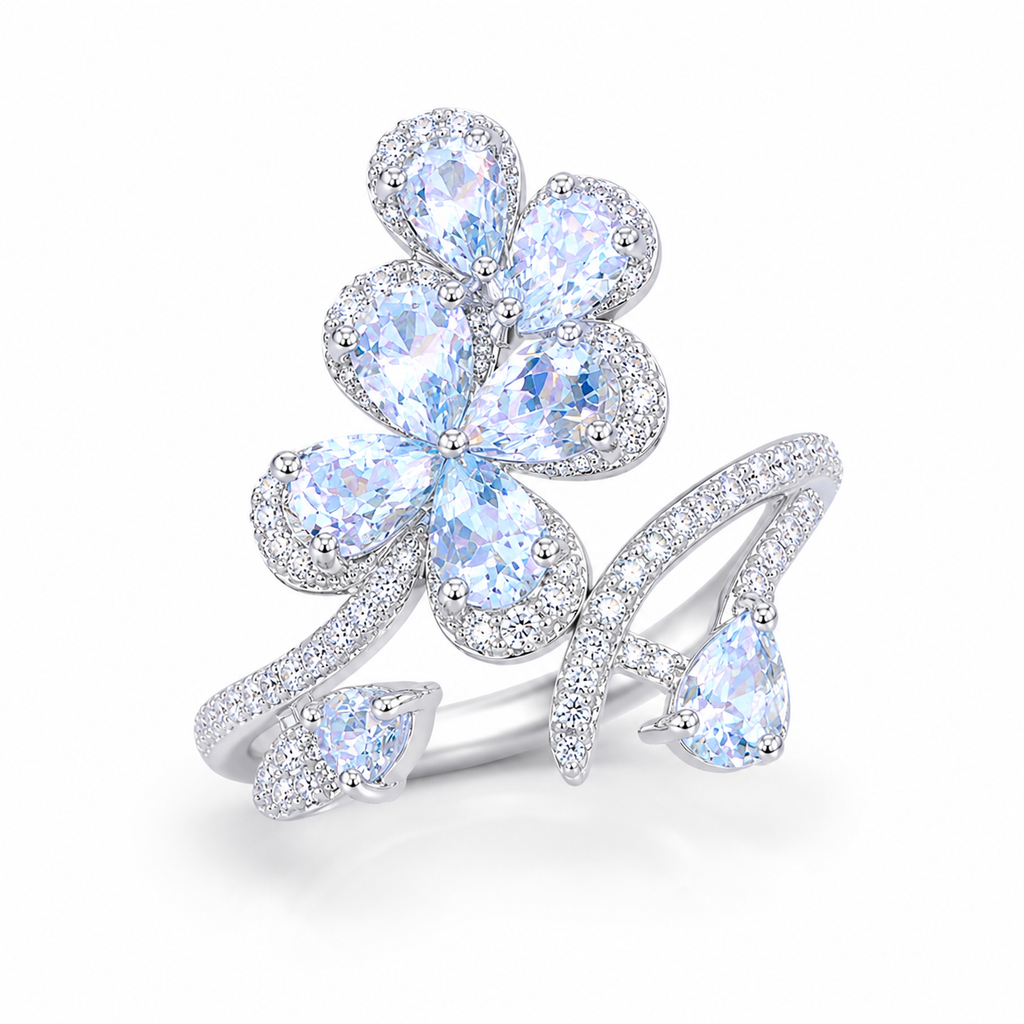 Natural aquamarine floral ring with 3x4mm pear-cut gemstones in sterling silver