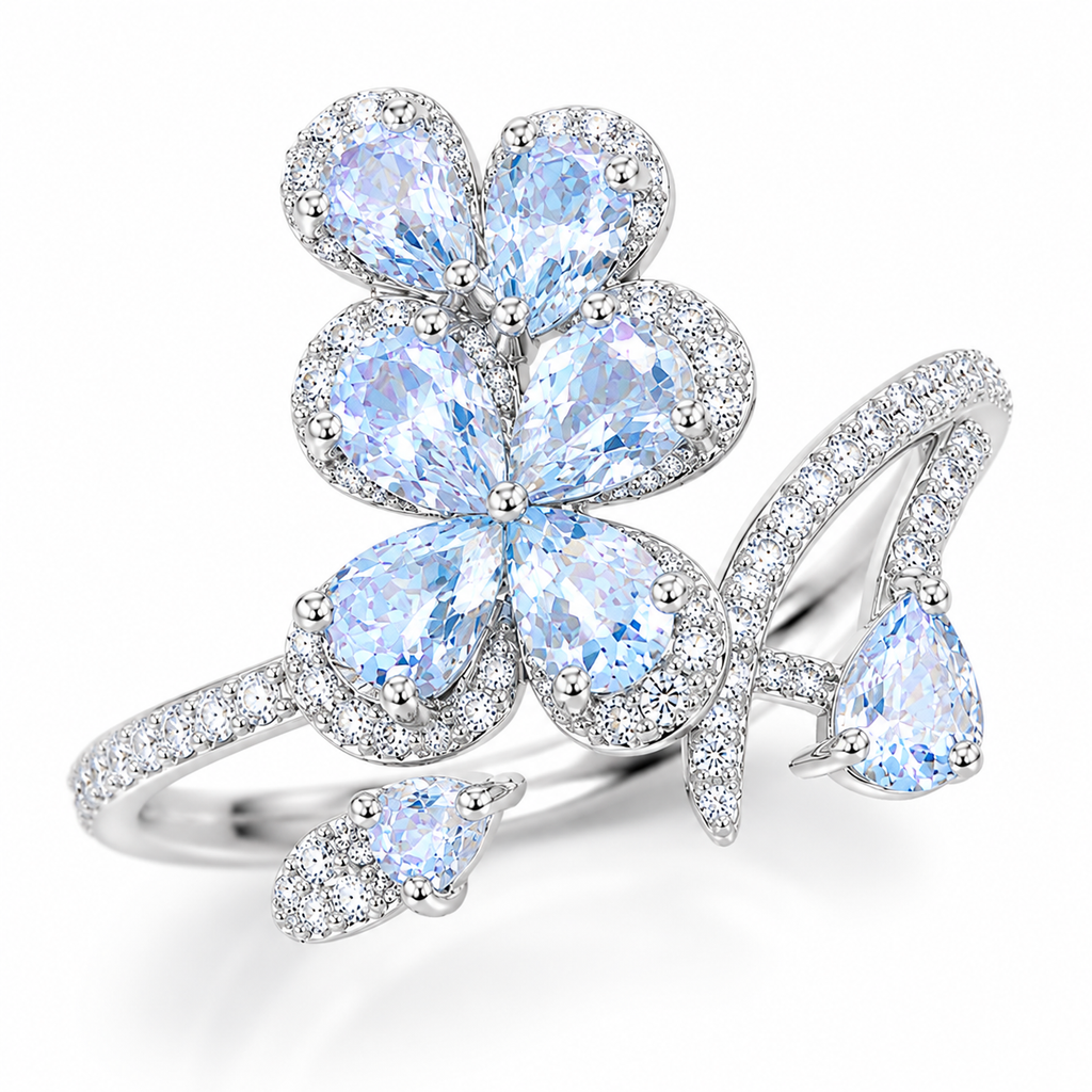 Natural aquamarine floral ring with 3x4mm pear-cut gemstones in sterling silver