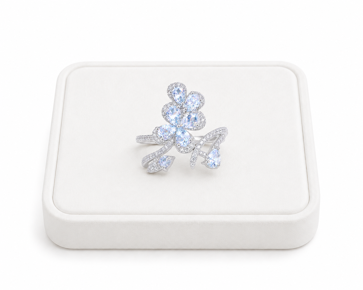 Natural aquamarine floral ring with 3x4mm pear-cut gemstones in sterling silver