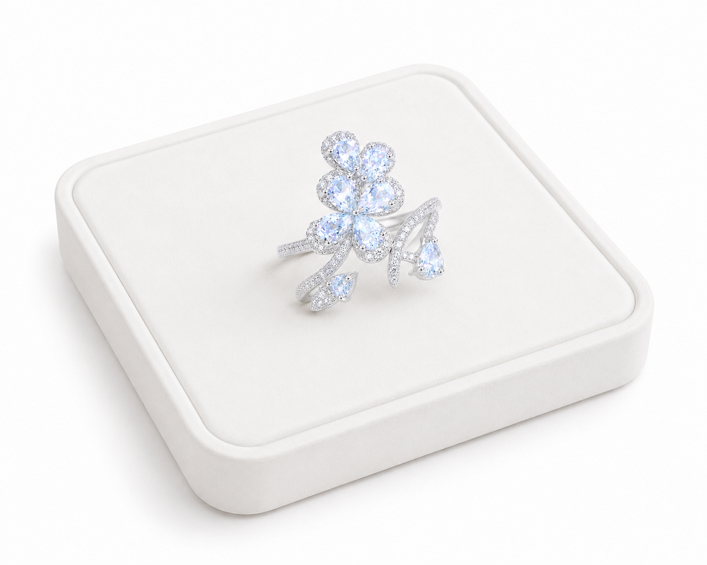Natural aquamarine floral ring with 3x4mm pear-cut gemstones in sterling silver