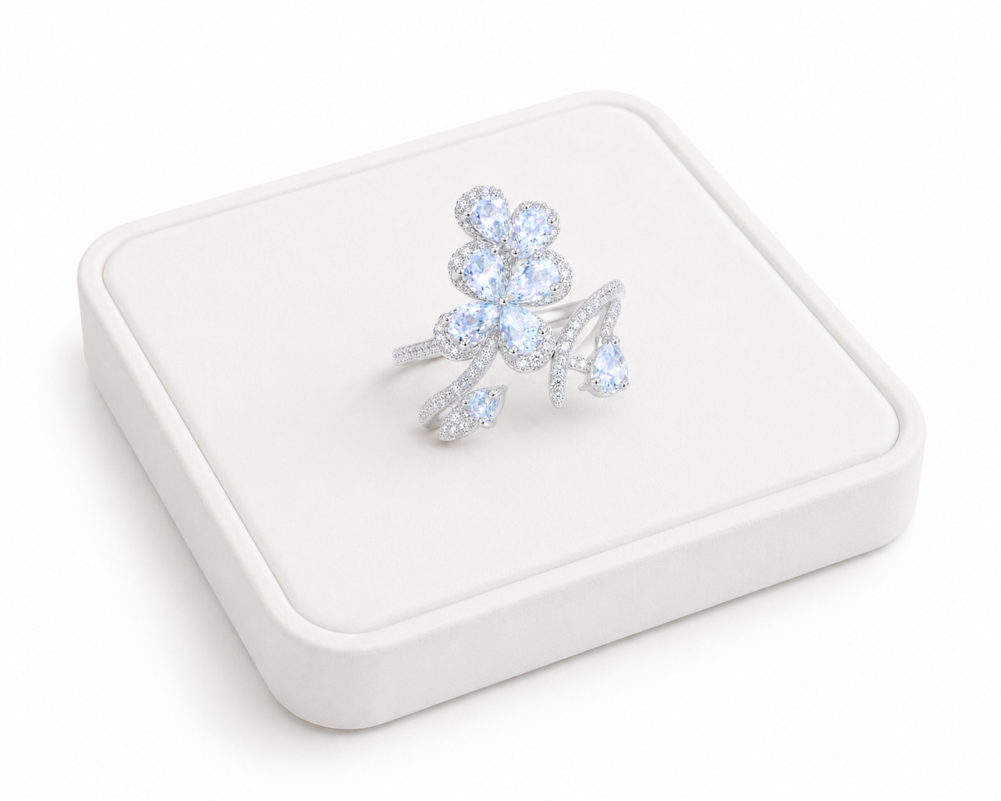 Natural aquamarine floral ring with 3x4mm pear-cut gemstones in sterling silver