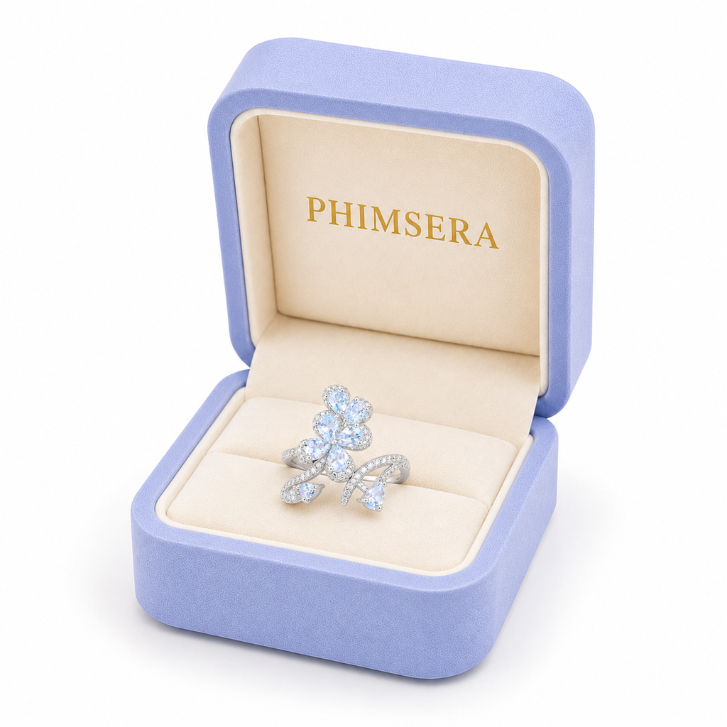 Natural aquamarine floral ring with 3x4mm pear-cut gemstones in sterling silver