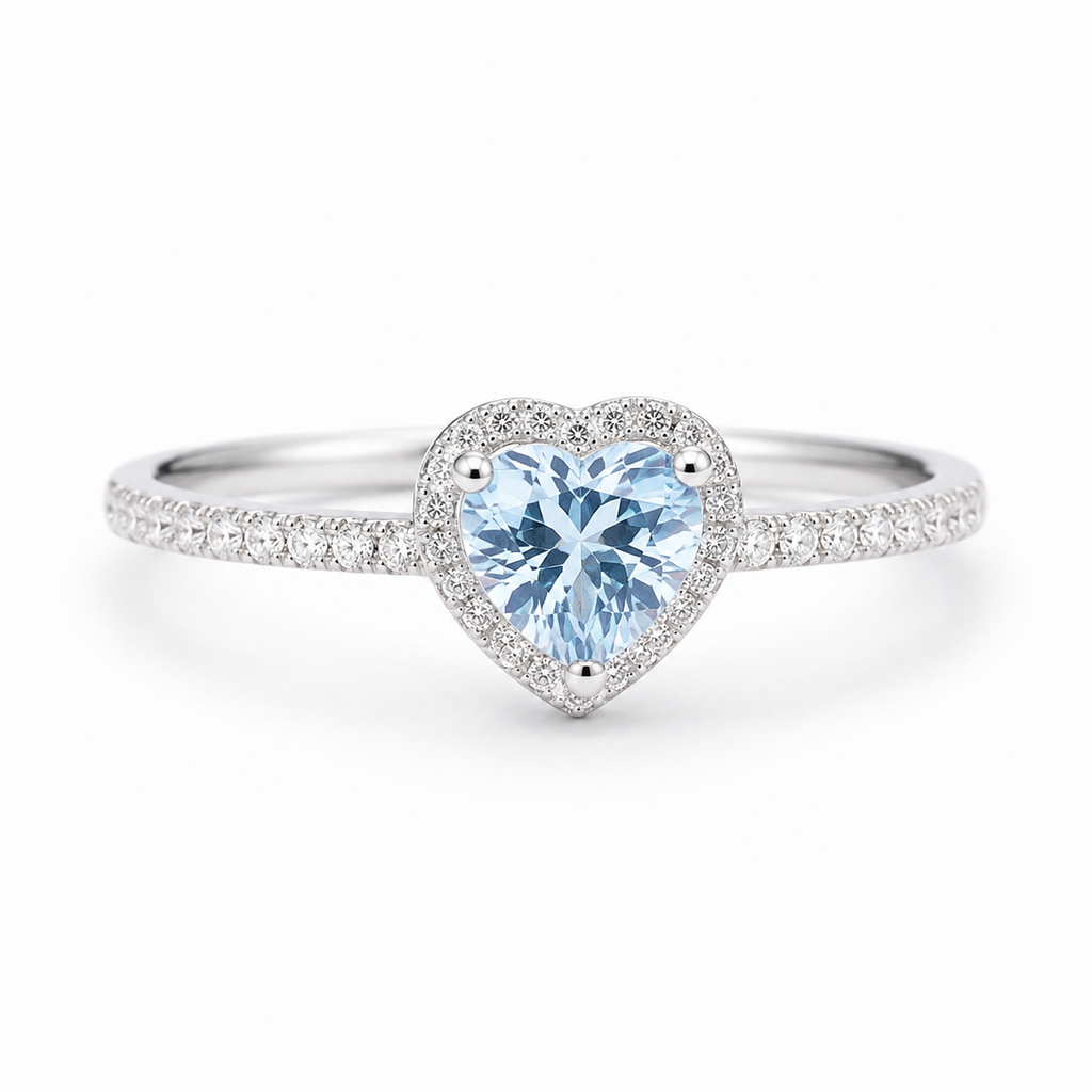 Natural 6mm heart-cut aquamarine ring with sparkling cubic zirconia halo in sterling silver