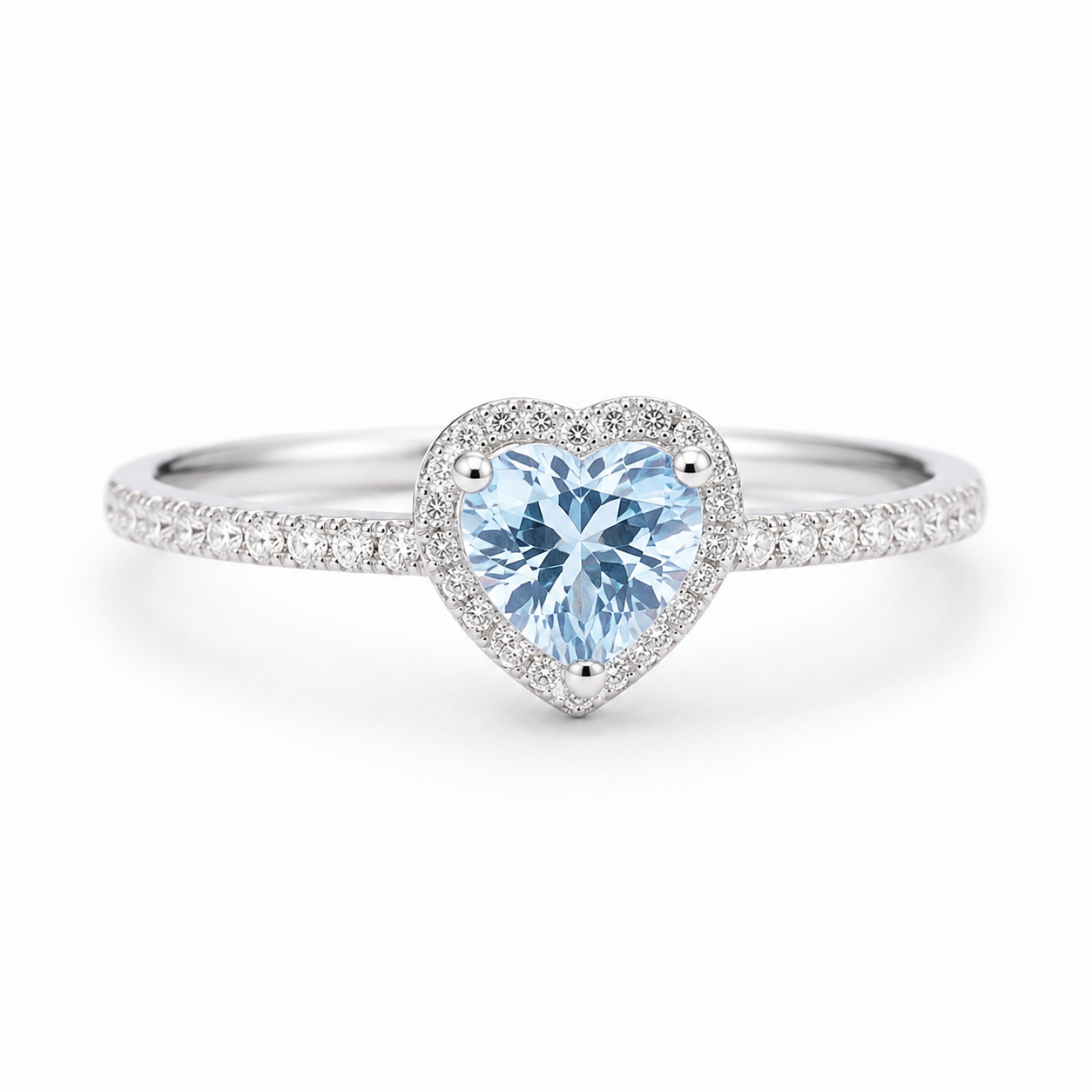 Natural 6mm heart-cut aquamarine ring with sparkling cubic zirconia halo in sterling silver
