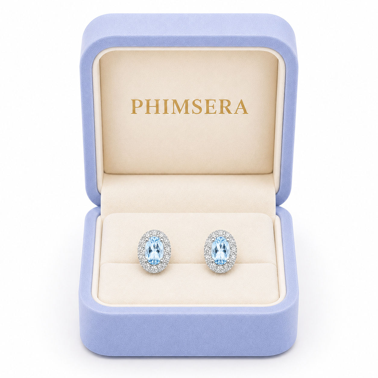 Phimsera 4x6mm Sky Blue Topaz halo stud earrings presented in luxury jewelry gift box