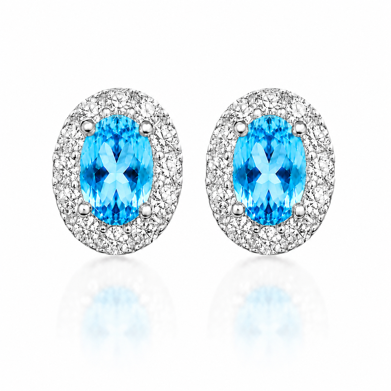 Natural 4x6mm Swiss Blue Topaz oval halo stud earrings in 925 sterling silver front view