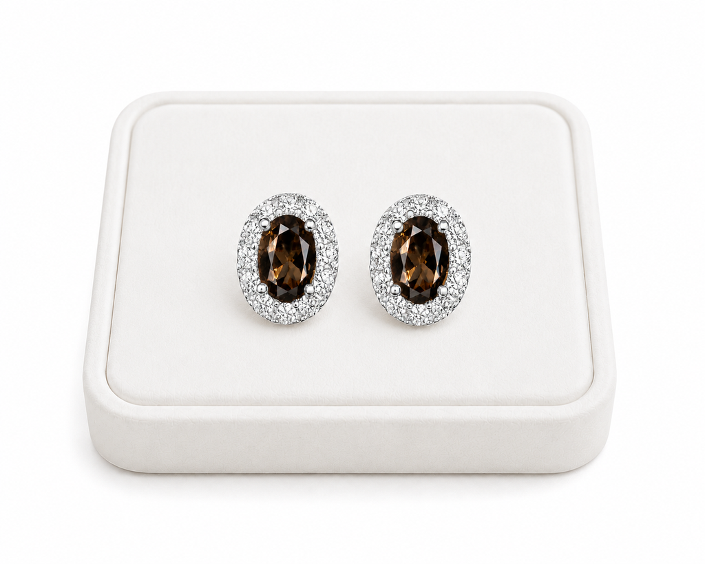 Natural 4x6mm smoky quartz halo stud earrings displayed on white jewelry tray