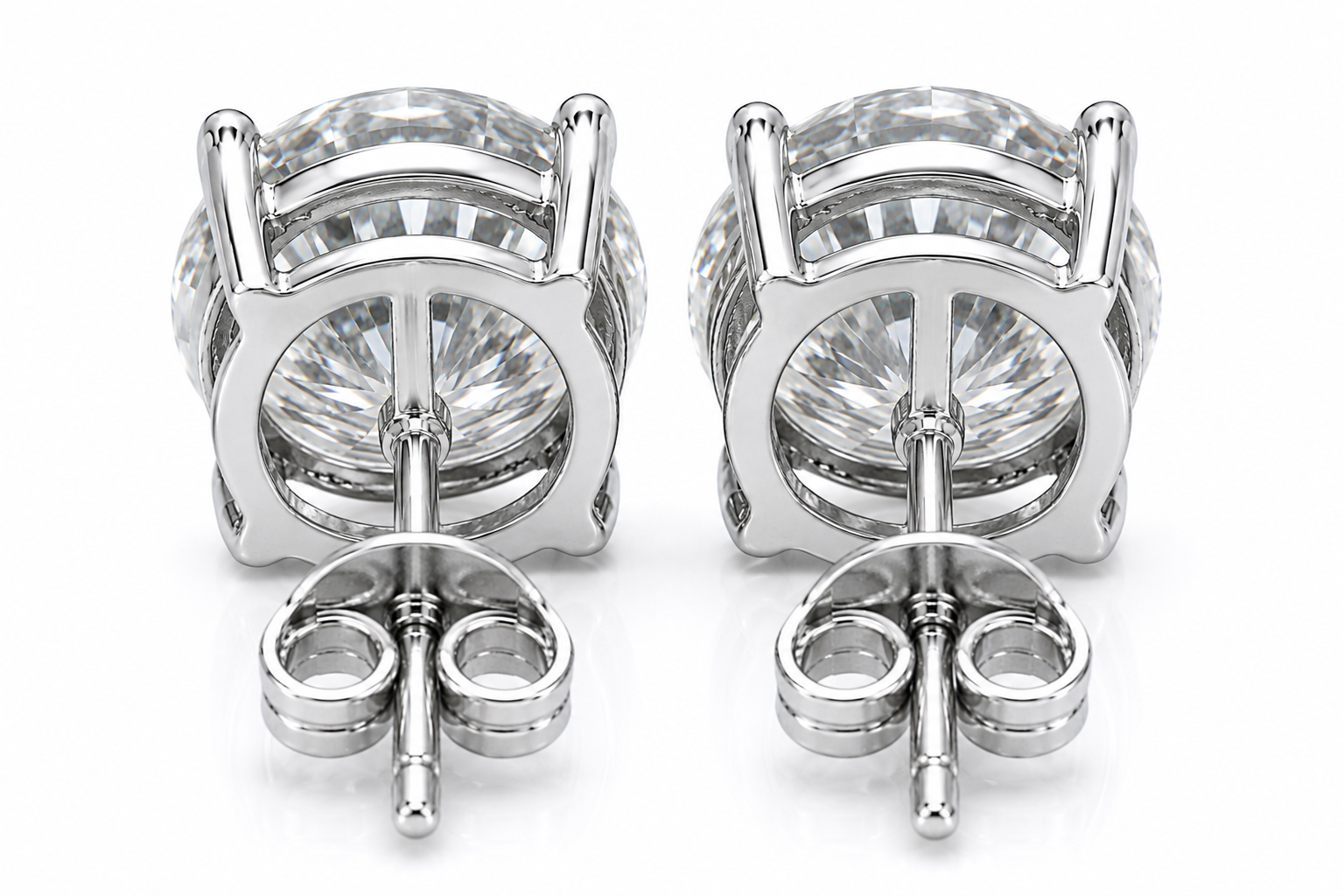 PHIMSERA VVS1 round brilliant moissanite stud earrings in platinum plated 925 sterling silver available in 1CT 2CT or 3CT sizes