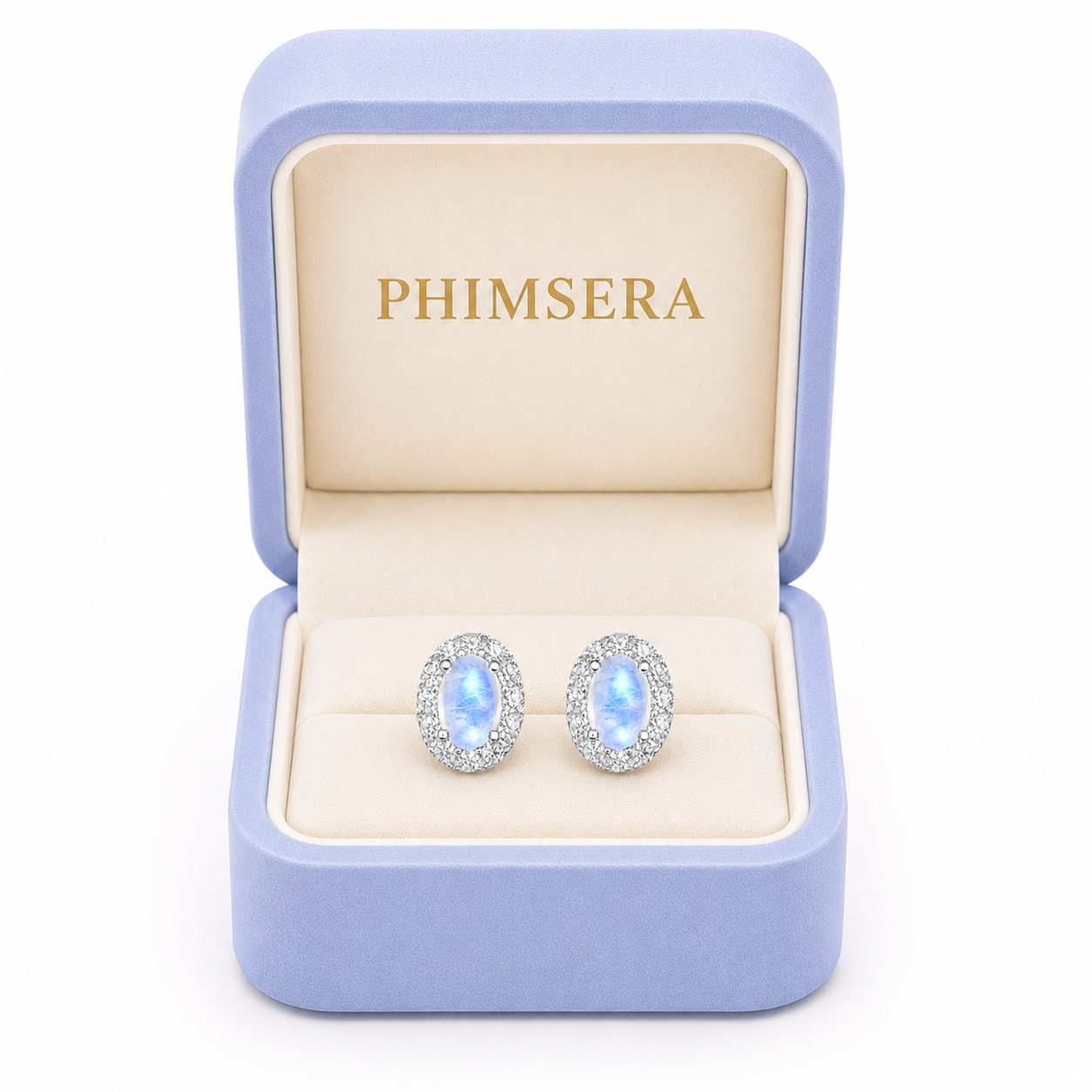 Natural 4x6mm Blue Moonstone earrings displayed in a Phimsera jewelry gift box