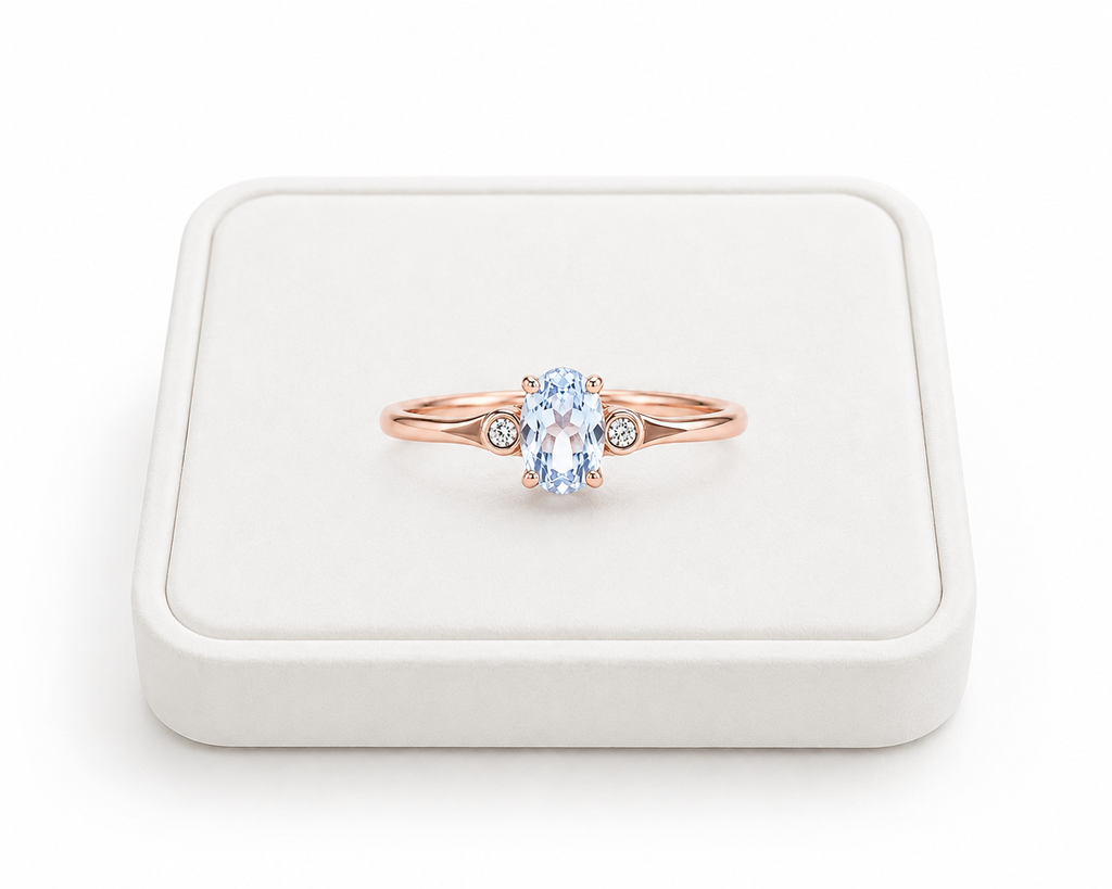 Natural 4x6mm oval aquamarine ring with delicate cubic zirconia accents in sterling silver