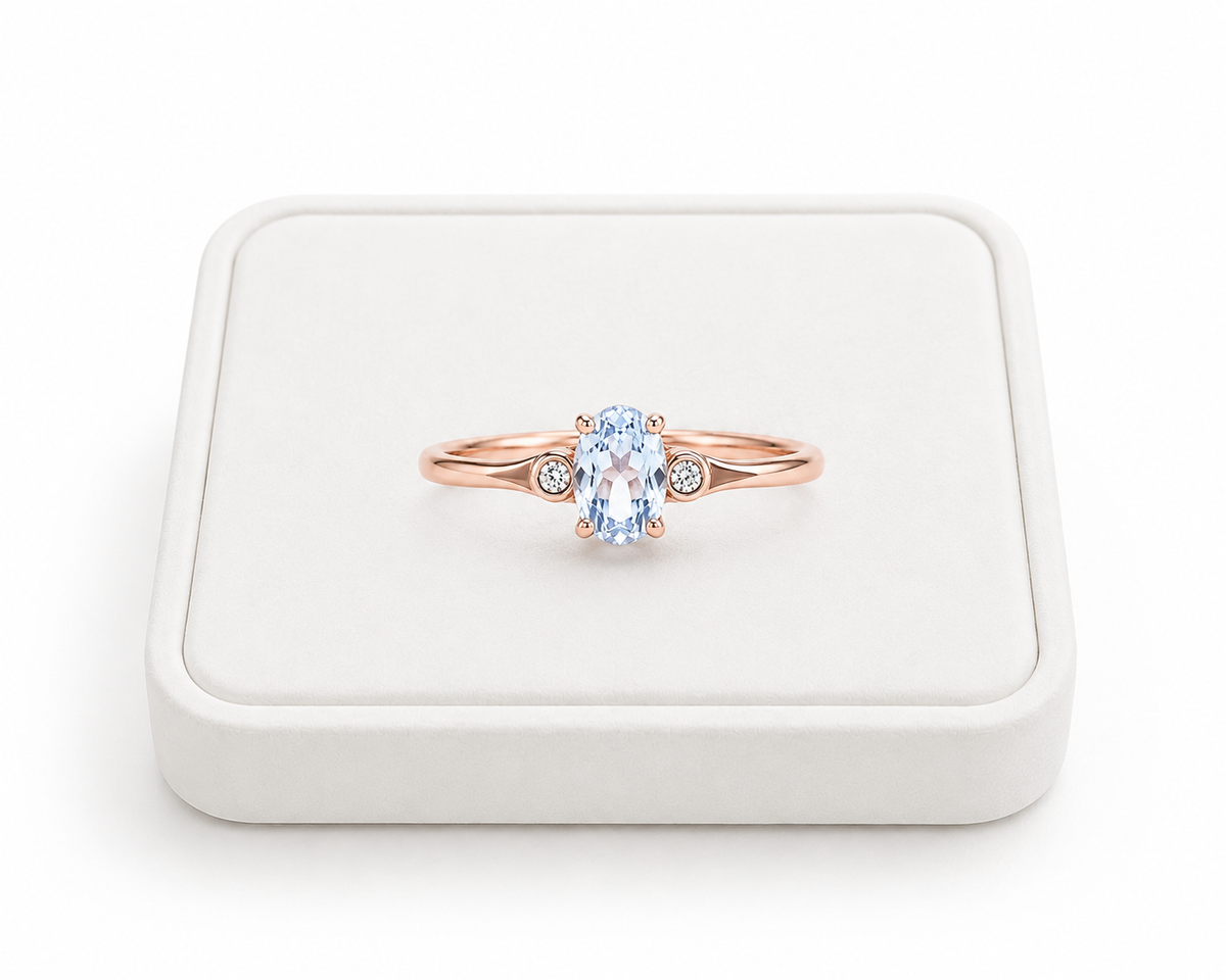 Natural 4x6mm oval aquamarine ring with delicate cubic zirconia accents in sterling silver