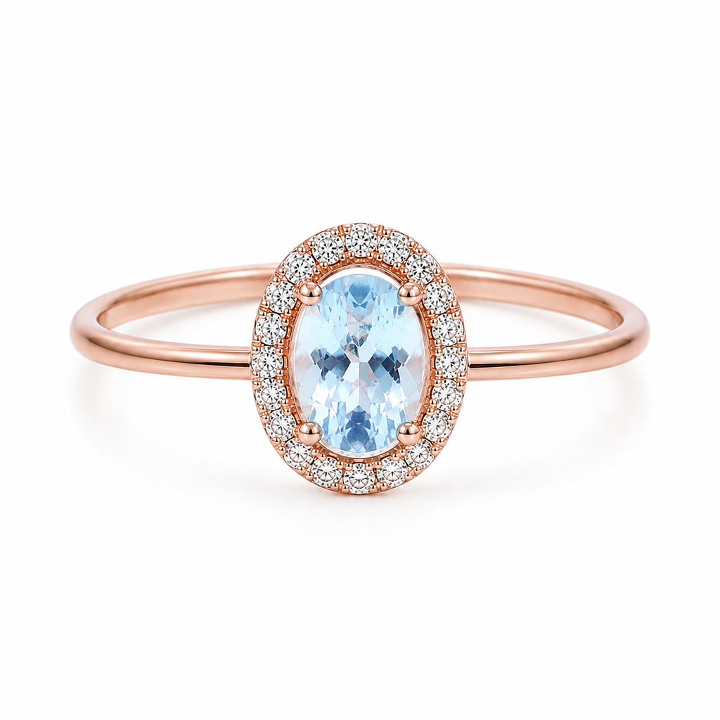 Top view of natural 4x6mm oval aquamarine halo ring with sparkling CZ accents