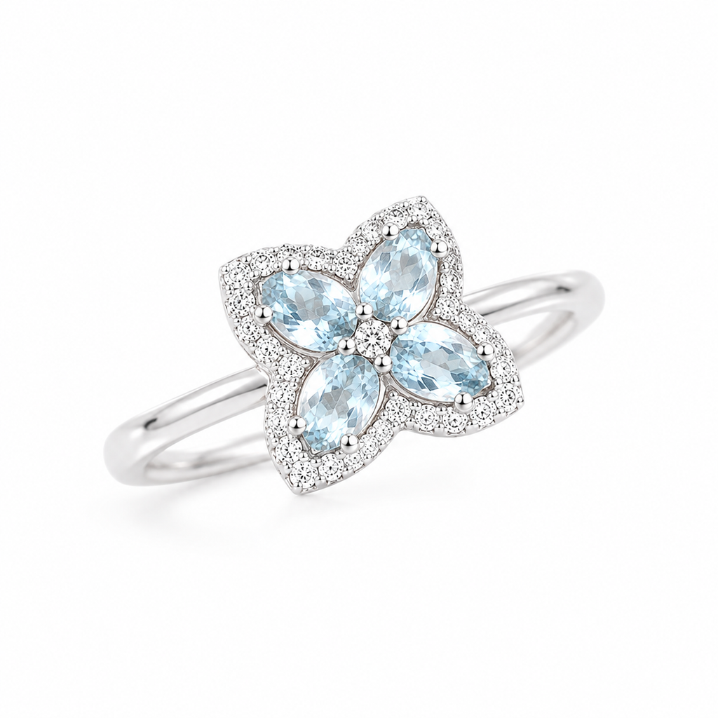 45 degree view of natural aquamarine four stone flower ring in 925 sterling silver