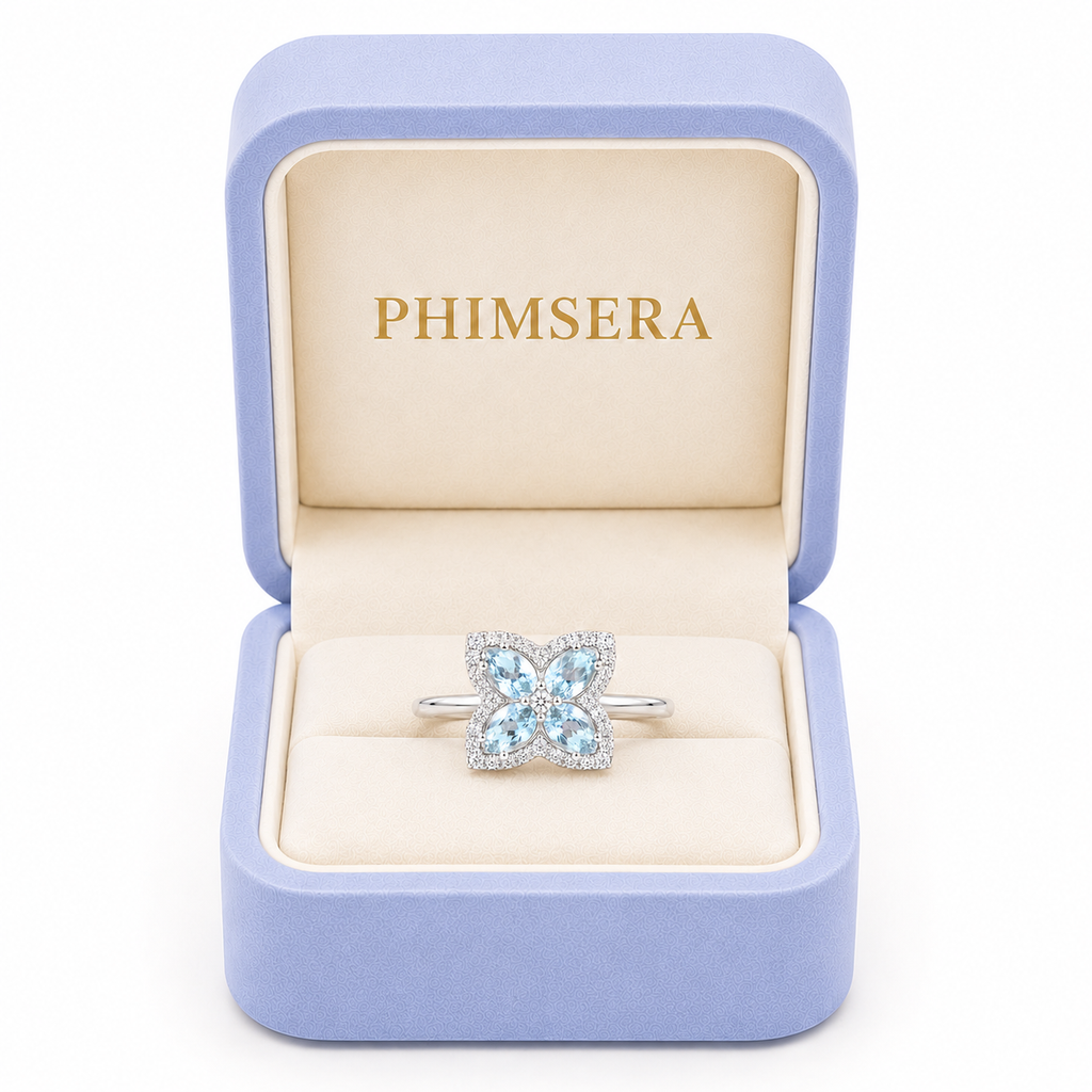 Natural aquamarine 4x5mm floral ring presented in a Phimsera jewelry gift box