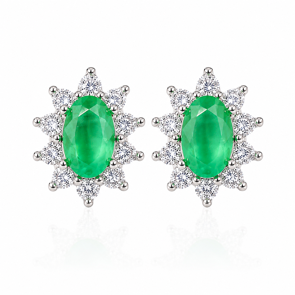 Natural 3x5mm oval emerald stud earrings in 925 sterling silver with sparkling cubic zirconia cluster accents
