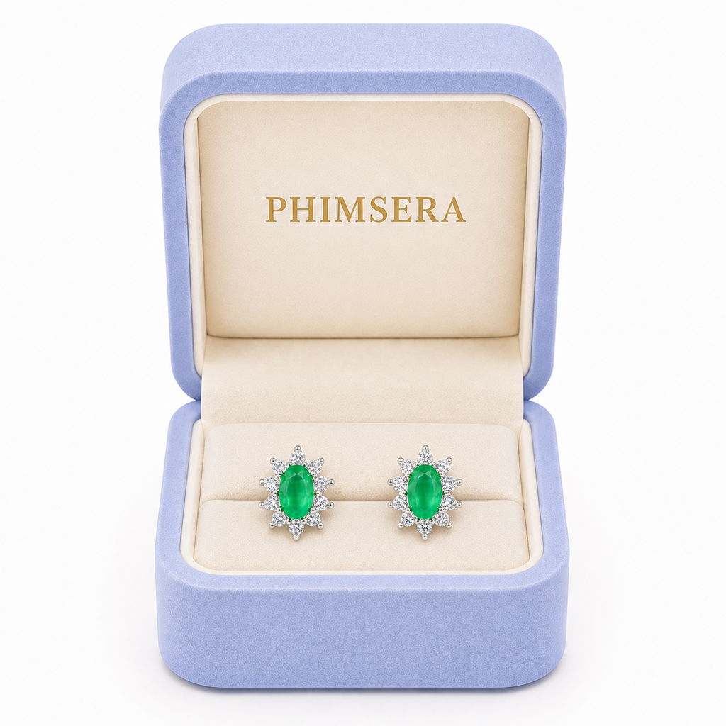 Phimsera natural emerald earrings presented in signature jewelry gift box