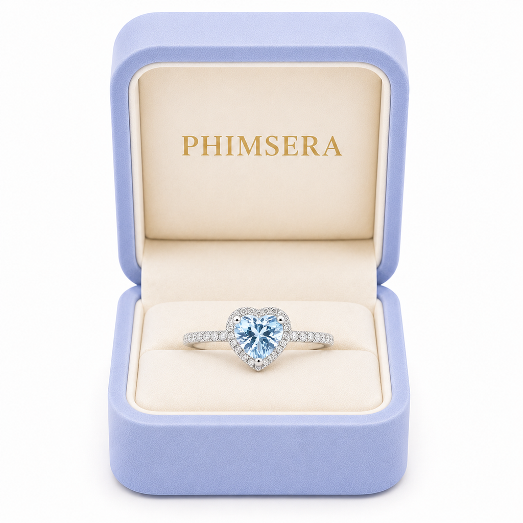Natural aquamarine heart-shaped March birthstone ring presented in luxury gift box
