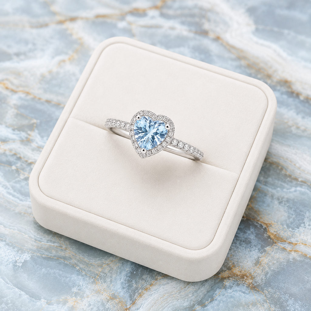 Natural 6mm heart-cut aquamarine ring with sparkling cubic zirconia halo in sterling silver