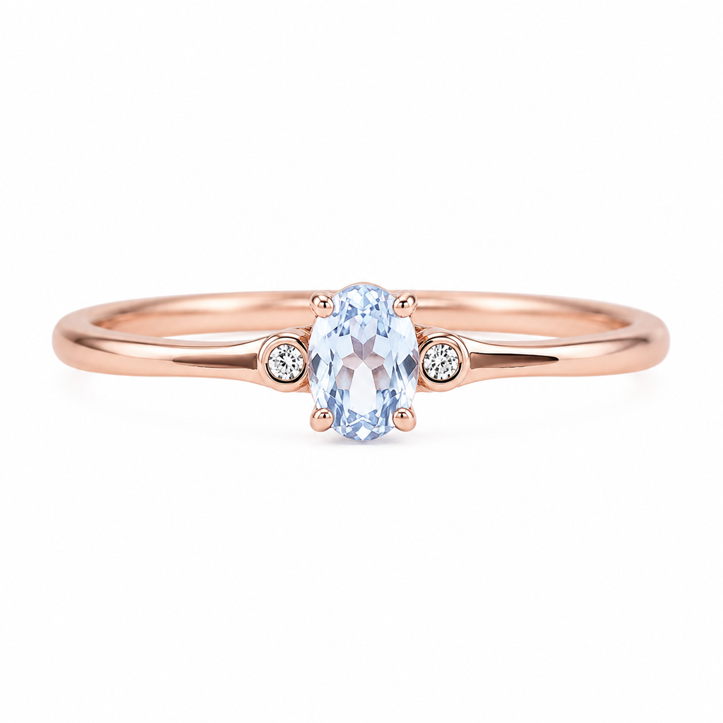 Natural 4x6mm oval aquamarine ring with delicate cubic zirconia accents in sterling silver