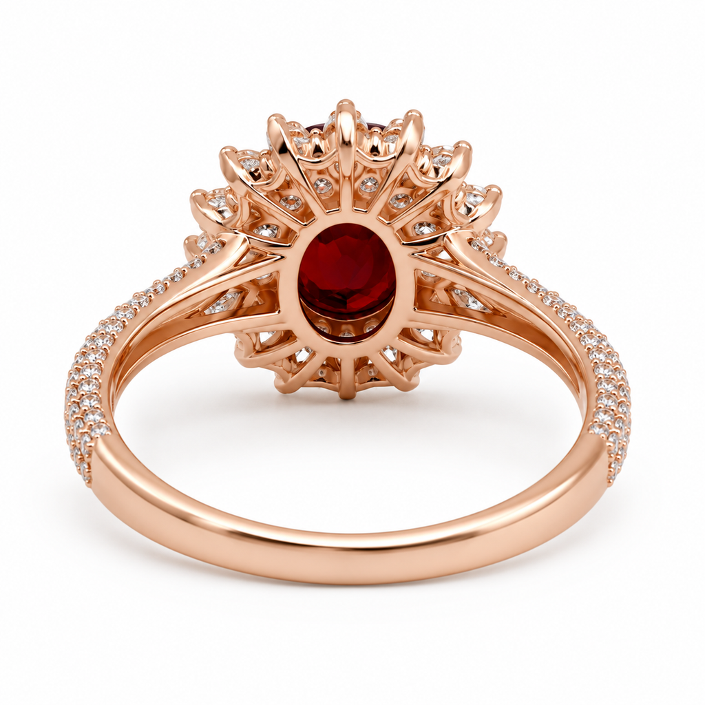 Natural 5x7mm oval red garnet halo ring with brilliant cubic zirconia accents in rose gold plated sterling silver.