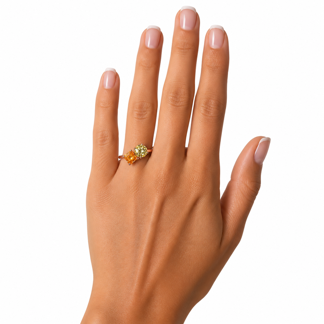 Two stone yellow moissanite ring featuring Asscher cut and round brilliant cut gemstones in rose gold plated 925 sterling silver on a white background