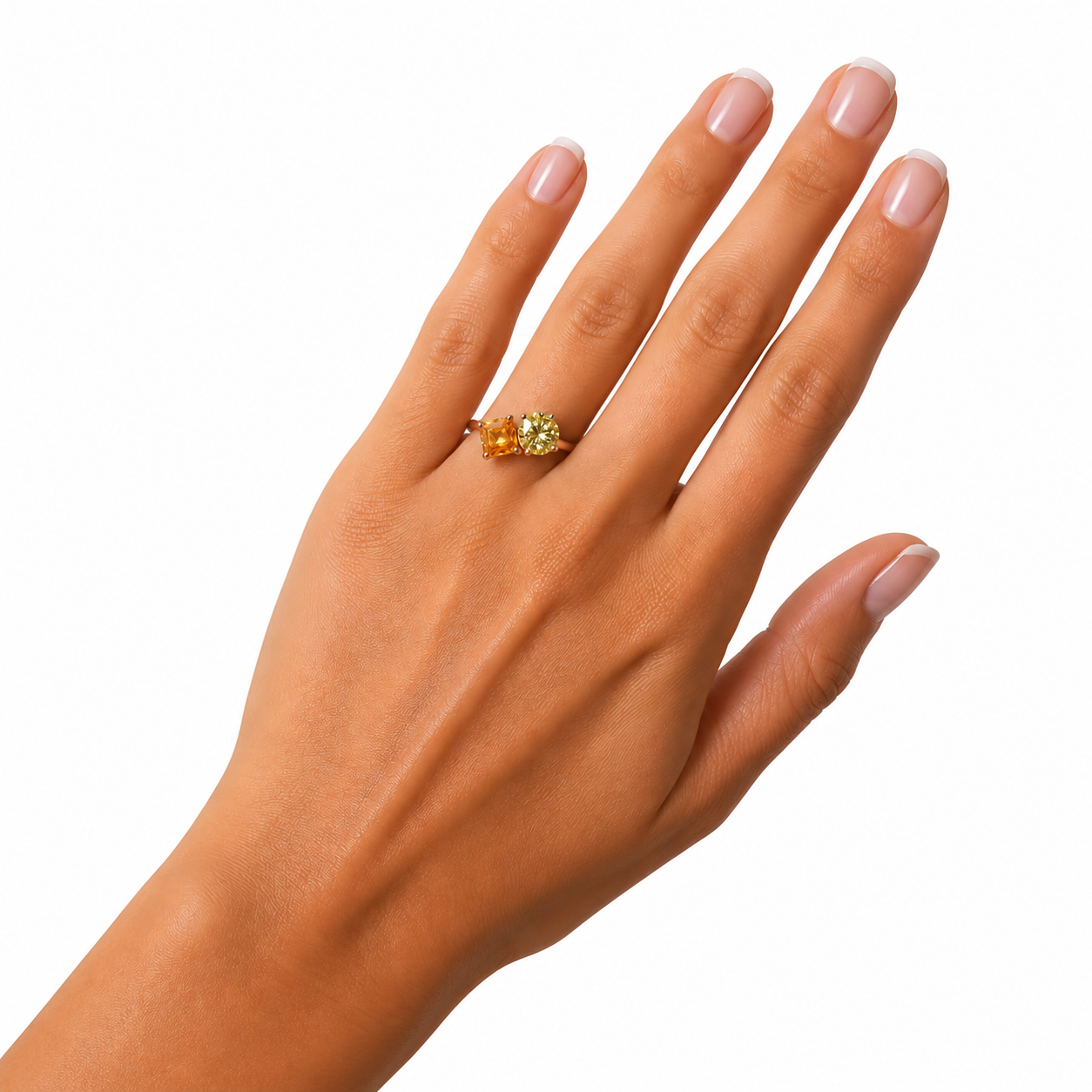 Two stone yellow moissanite ring featuring Asscher cut and round brilliant cut gemstones in rose gold plated 925 sterling silver on a white background