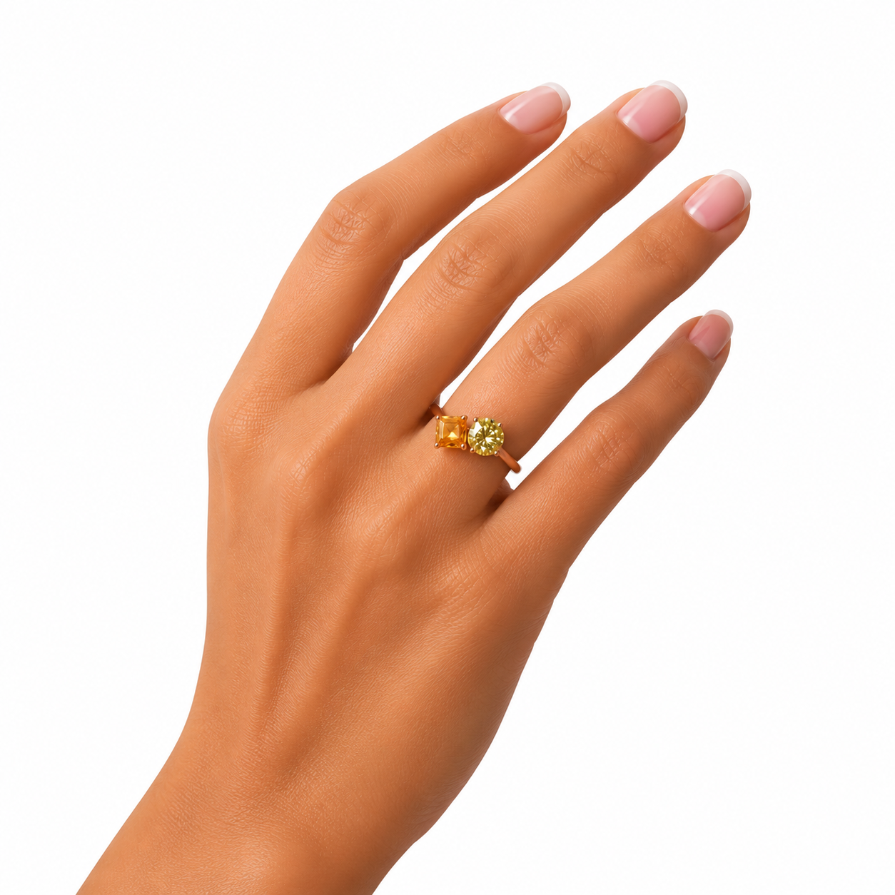 Two stone yellow moissanite ring featuring Asscher cut and round brilliant cut gemstones in rose gold plated 925 sterling silver on a white background