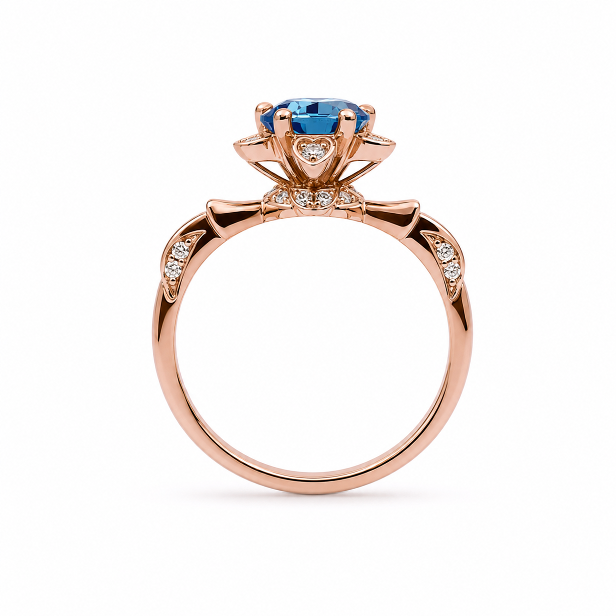 Royal Blue 6.5mm VVS1 round brilliant moissanite floral ring with cubic zirconia accents in rose gold plated sterling silver on a white background