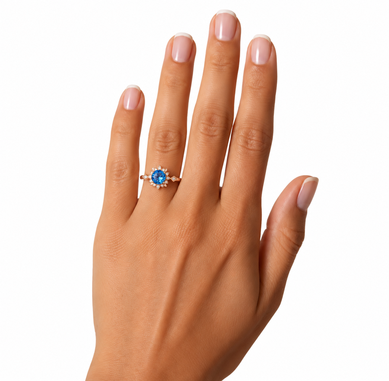 Royal Blue 6.5mm VVS1 round brilliant moissanite floral ring with cubic zirconia accents in rose gold plated sterling silver on a white background